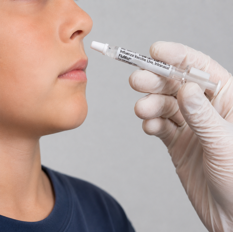 Health News & Articles 23 Administering FluMist to Child